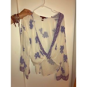 Patterned blue and white floral blouse